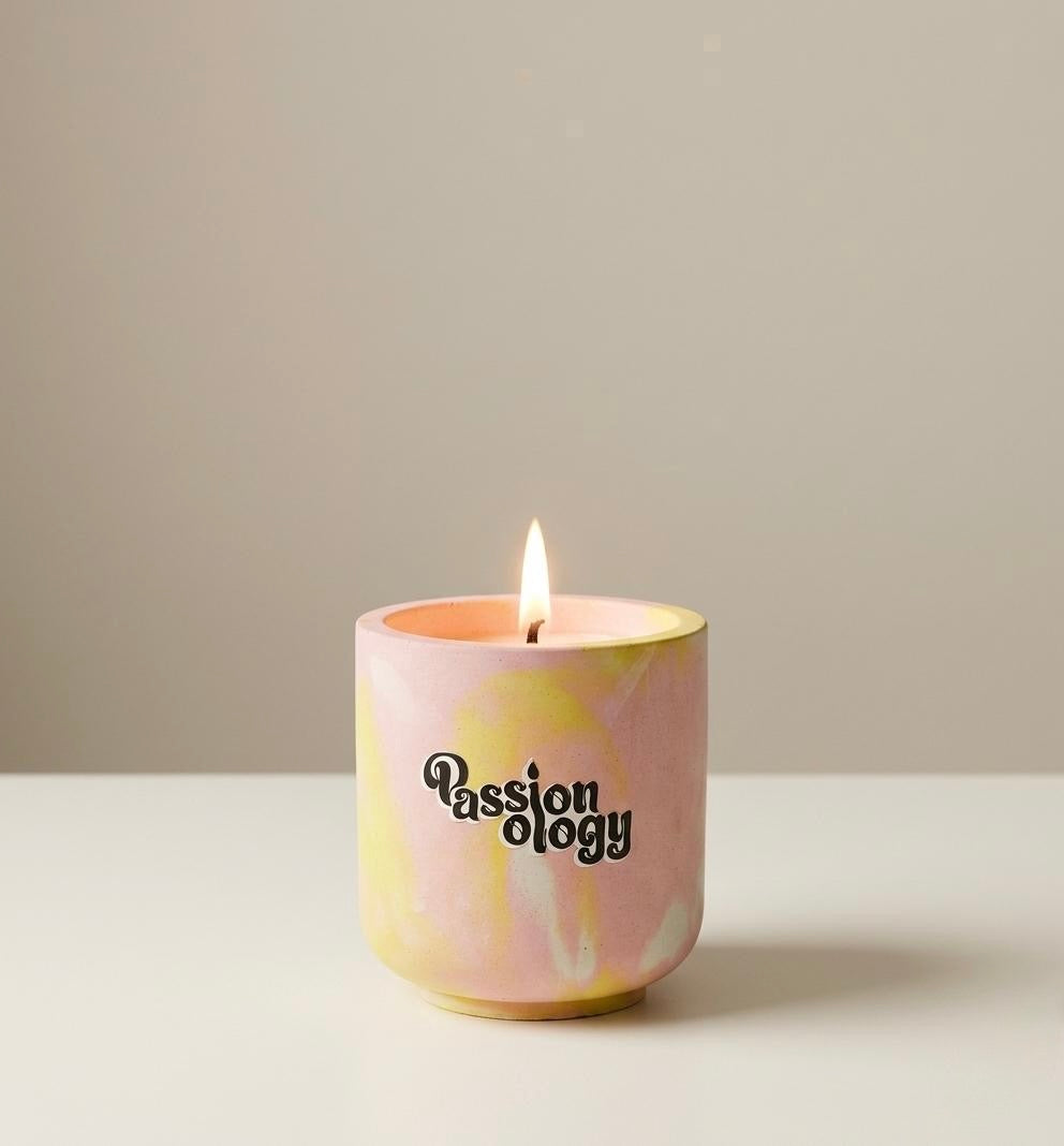 HIBI Mixed Floral candle lit in pink marble jar