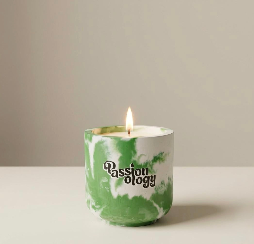 EMMA candle lit in green marble jar